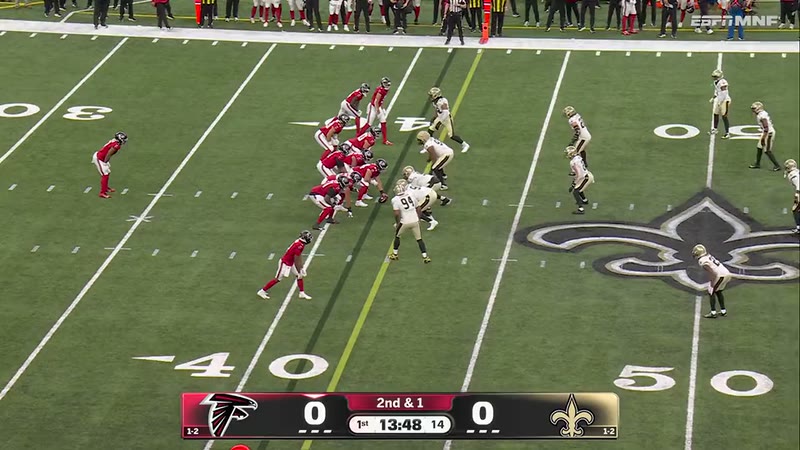 Bijan Robinson's touchdown play on the main TV.